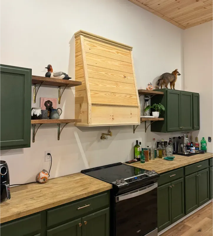 Green kitchen with wood countertops renovated by Accuardi Bros